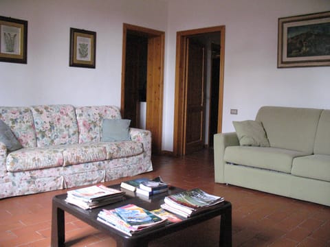 Condo, Sea View | Living area | TV