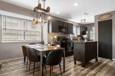 Condo, Multiple Beds, Balcony, Garden View (Time Traveler Suite) | Private kitchen | Coffee/tea maker, dining tables