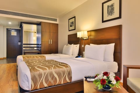 Deluxe Twin Room | 1 bedroom, minibar, in-room safe, individually decorated