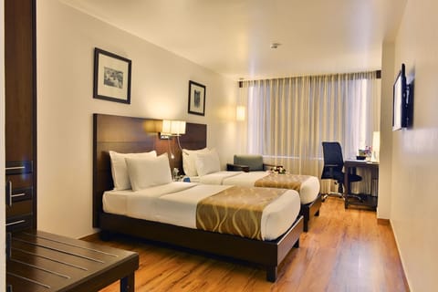 Premium Room | 1 bedroom, minibar, in-room safe, individually decorated