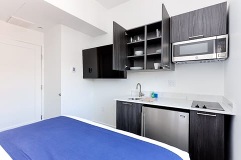 Basic Studio (4th Floor - Unit #402) | Individually furnished, iron/ironing board, free WiFi, bed sheets