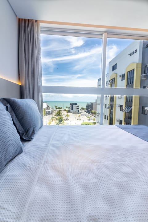 Superior Suite, Ocean View | Minibar, in-room safe, laptop workspace, blackout drapes