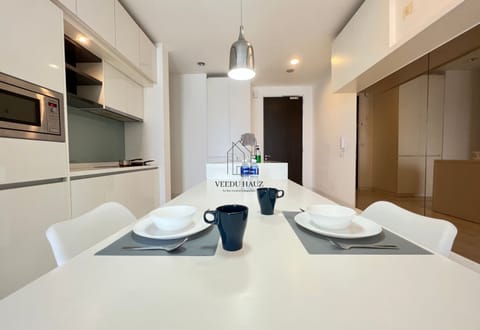 Two Bedroom Apartment | Living area | 32-inch flat-screen TV with cable channels, TV, Netflix