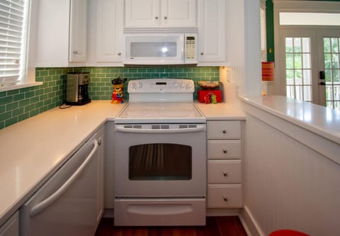 Cottage, Multiple Beds, Balcony, Beach View | Private kitchen | Fridge, microwave, oven, stovetop