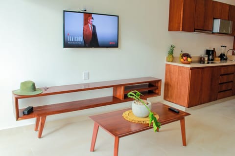 40-inch flat-screen TV with cable channels, TV