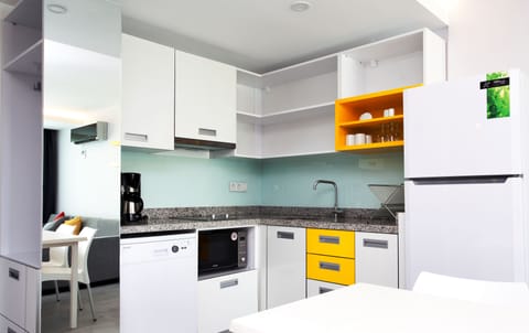 Family Apartment, 1 Bedroom | Private kitchen | Mini-fridge, stovetop, dishwasher, coffee/tea maker