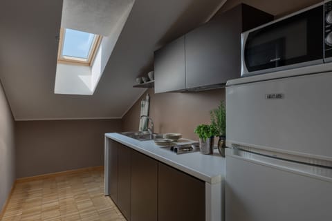 Apartment, 1 Bedroom | Private kitchenette | Fridge