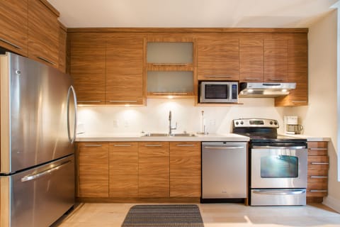 Loft , 1 King Bed, view St-Jean Street (201) | Private kitchen | Full-size fridge, microwave, oven, stovetop