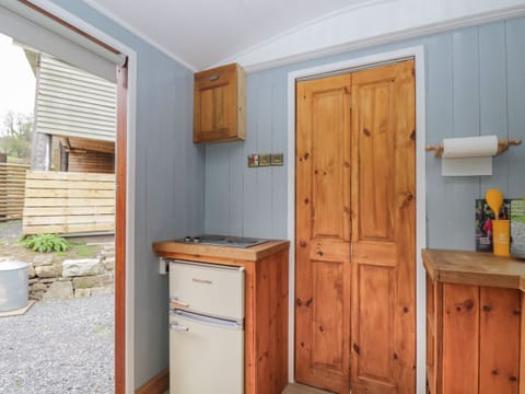 Fridge, electric kettle, toaster, cookware/dishes/utensils