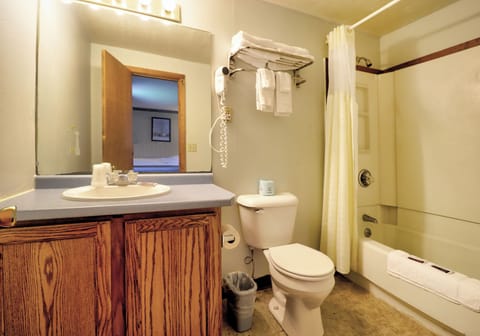 Standard Room, 2 Queen Beds, Non Smoking | Bathroom | Combined shower/tub, rainfall showerhead, designer toiletries, towels