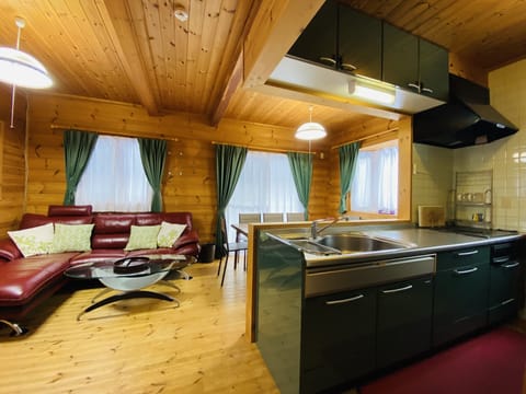 Family Cottage | Private kitchen | Full-size fridge, microwave, stovetop, coffee/tea maker