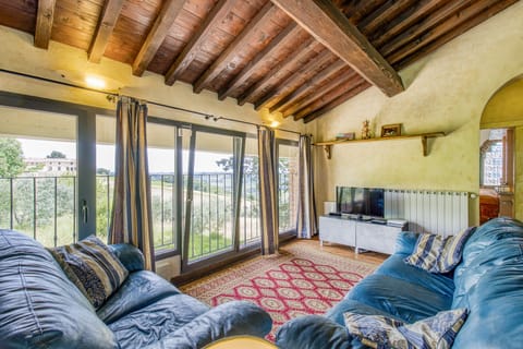 Family House, 3 Bedrooms, 2 Bathrooms, Mountainside (Villa Ademollo with Pool in Chianti) | Living area | TV, fireplace