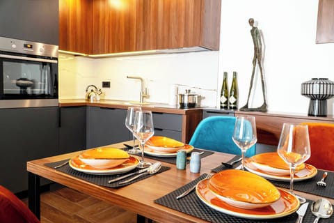 Standard Apartment | Private kitchen | Mini-fridge, oven, highchair, cookware/dishes/utensils