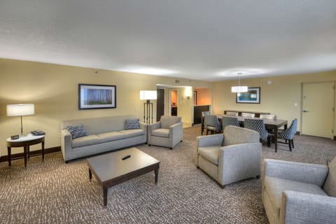 Presidential Suite, 1 King Bed | Living area | 50-inch flat-screen TV with cable channels, TV