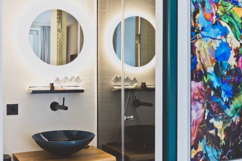 Shower, free toiletries, hair dryer, slippers