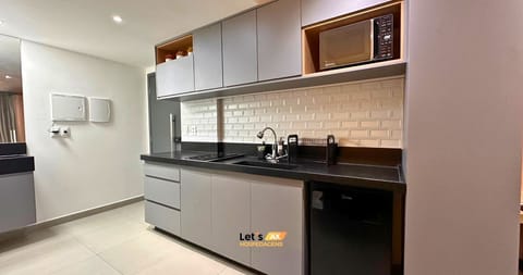 Studio | Private kitchen | Mini-fridge, microwave, cleaning supplies