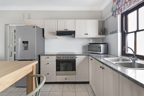 Classic Apartment | Private kitchen | Fridge, microwave, oven, stovetop