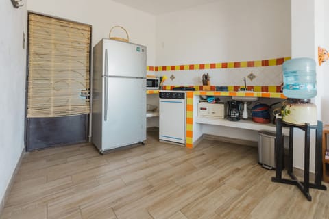 Junior Apartment | Private kitchen | Fridge, electric kettle, blender, cookware/dishes/utensils