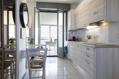 Panoramic Apartment | Private kitchen | Full-size fridge, microwave, stovetop, dishwasher