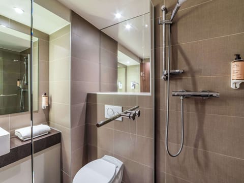 Shower, eco-friendly toiletries, hair dryer, towels