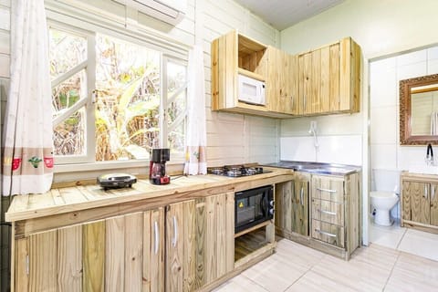 Cabin | Private kitchen | Fridge, oven, toaster, cookware/dishes/utensils