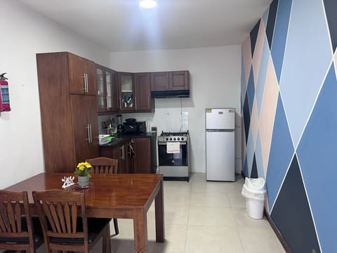 Comfort Apartment | Private kitchen | Full-size fridge, microwave, stovetop, dishwasher