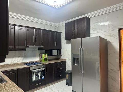 Apartment | Private kitchen | Fridge, microwave, oven, stovetop