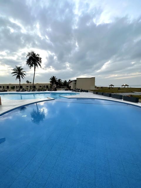 Outdoor pool, pool umbrellas, sun loungers