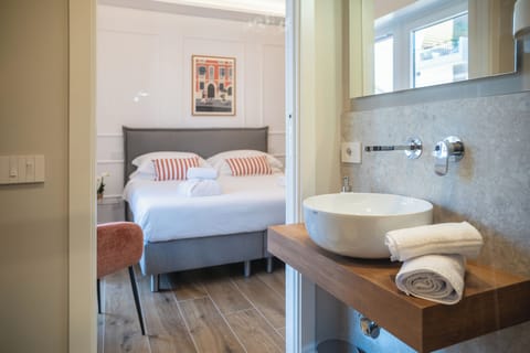 Bathroom | Shower, rainfall showerhead, hair dryer, bathrobes