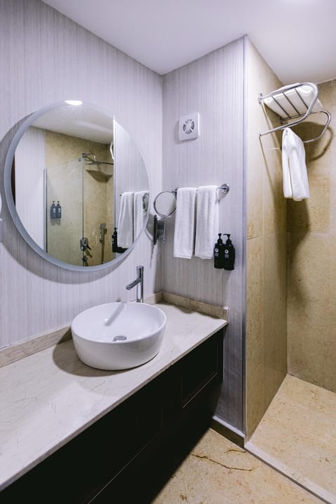 Shower, free toiletries, hair dryer, slippers