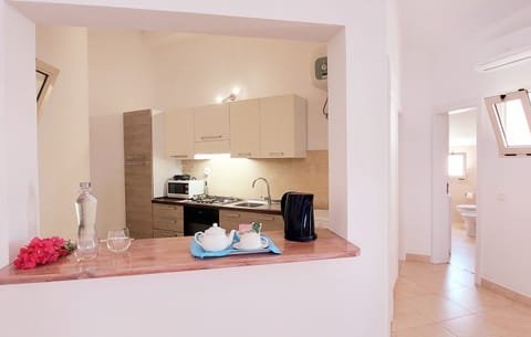 Deluxe Apartment | Private kitchen | Mini-fridge, espresso maker, electric kettle