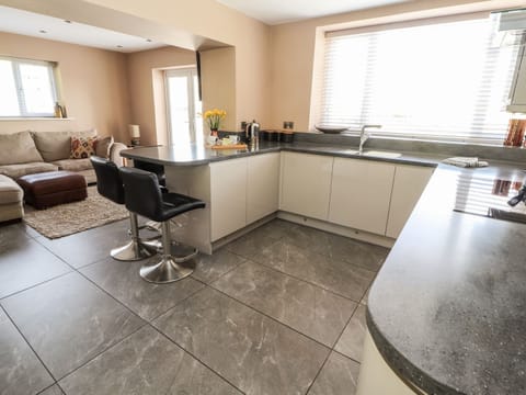 Fridge, electric kettle, cookware/dishes/utensils