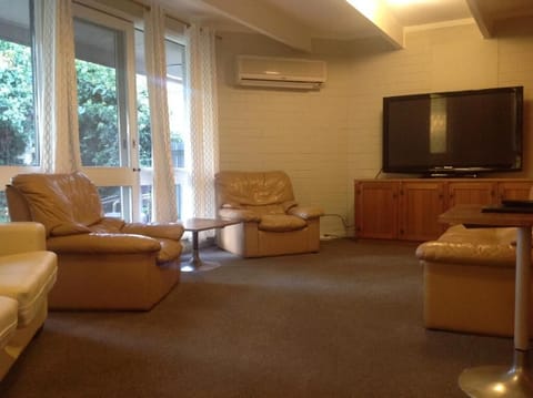 Standard Suite, 2 Bedrooms, Non Smoking, Kitchen (Self Contained Unit) | Living area | Flat-screen TV