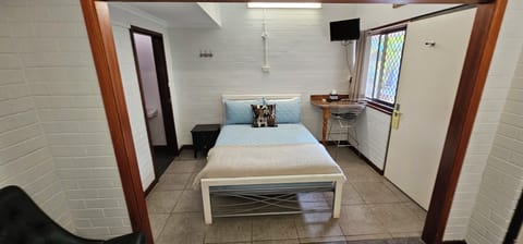 Family Room, Lanai | Iron/ironing board, bed sheets