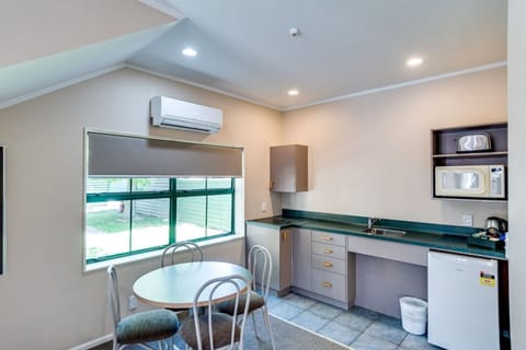 Family Room, Non Smoking, Kitchen (Family unit) | Private kitchenette | Fridge, microwave, stovetop, coffee/tea maker