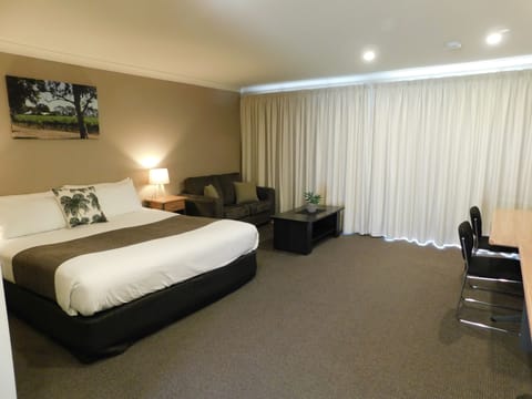 Deluxe east side King suite | Desk, iron/ironing board, cribs/infant beds, free WiFi