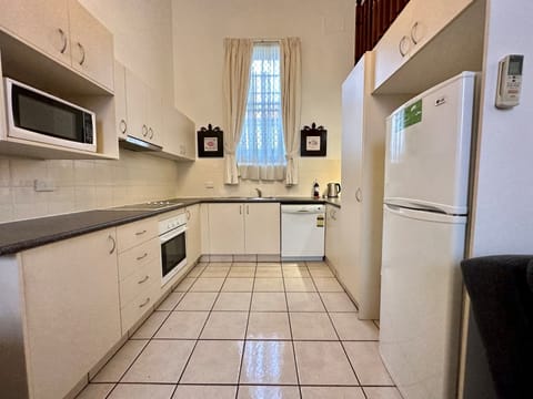 Apartment | Private kitchen | Full-size fridge, microwave, stovetop, electric kettle