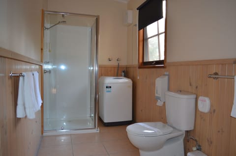 Two Bedroom Luxury Self Contained Lodge | Bathroom | Shower, hair dryer, towels