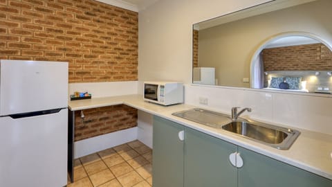 Family Room, Non Smoking, Kitchenette | Private kitchenette | Microwave, electric kettle, toaster, cookware/dishes/utensils