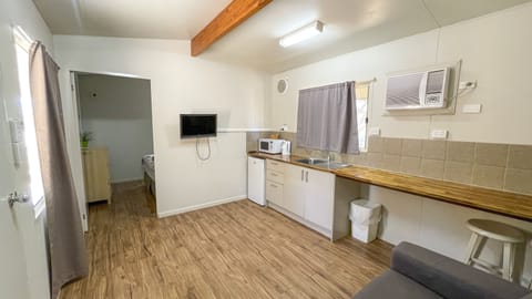 Standard Cabin – Shared Bathroom (No Bathroom inside Room) | Private kitchen | Fridge, microwave, stovetop, electric kettle