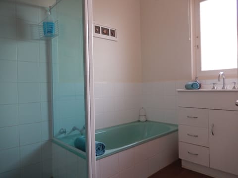 Separate tub and shower, free toiletries, hair dryer, towels