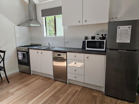 Premium Studio Suite, 1 Queen Bed, Non Smoking, Garden View | Private kitchen | Full-size fridge, microwave, electric kettle, toaster