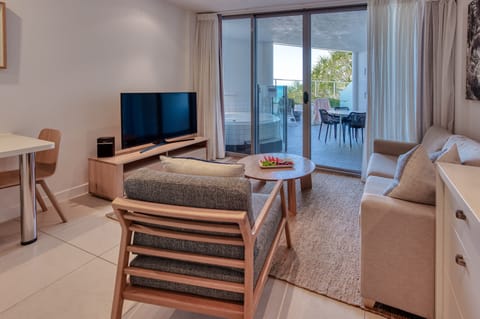 Studio, Beachfront | Living area | Flat-screen TV, DVD player