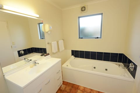 One Bedroom Unit | Bathroom | Hair dryer, towels