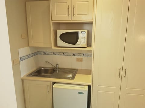 Off Street Kitchenette | Private kitchenette | Mini-fridge, microwave, toaster