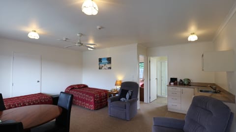 Premium Suite, 1 Bedroom, Non Smoking, Kitchenette | Premium bedding, laptop workspace, iron/ironing board, cribs/infant beds