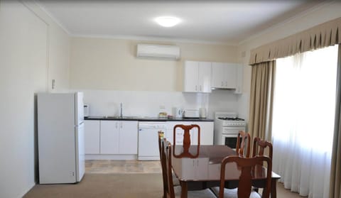 Family Suite, 3 Bedrooms, Kitchen | Private kitchen | Fridge, coffee/tea maker, electric kettle