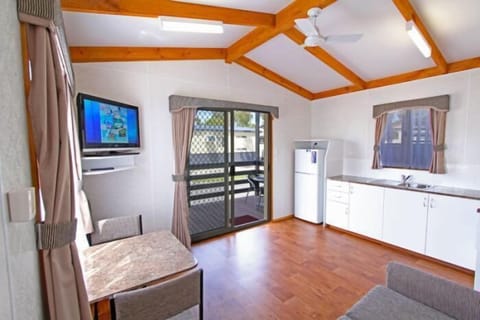 Queen Cabin | Living area | LCD TV, DVD player, table tennis