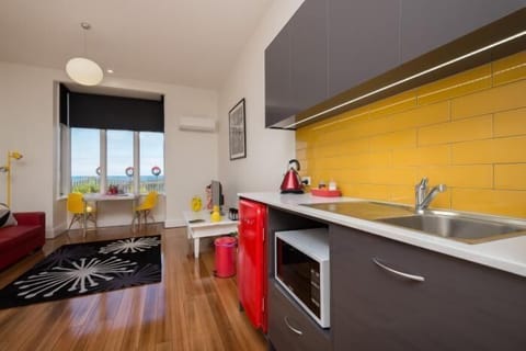 Apartment, 1 Bedroom, Ensuite | Private kitchenette | Fridge, microwave, coffee/tea maker, electric kettle