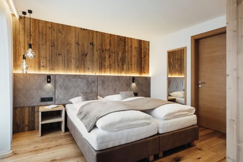 Premium bedding, down comforters, pillowtop beds, in-room safe